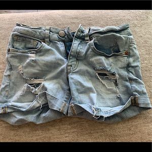 light blue ripped jean shorts